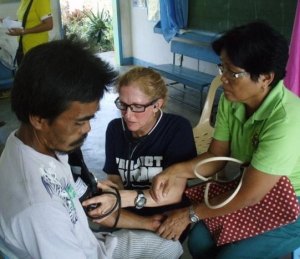 Nurse practitioner Mary-Beth Gardner, center, volunteered with Project HOPE.  